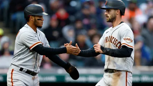 CLEVELAND, OH - APRIL 16: Thairo Estrada #39 and Steven Duggar #6 of the San Francisco Giants celebrate after scoring on a single by Brandon Belt against the Cleveland Guardians during the fifth inning at Progressive Field on April 16, 2022 in Cleveland, Ohio. The Giants defeated the Guardians 4-2. (Photo by Ron Schwane/Getty Images)