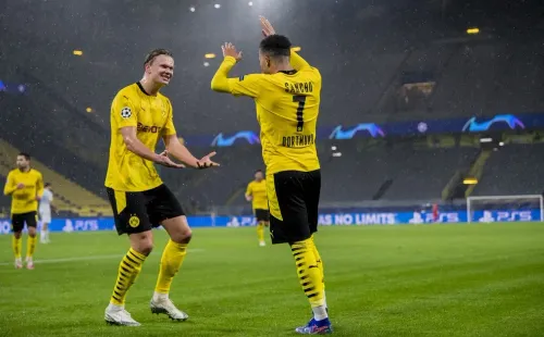 Sancho e Haaland comemorando gol. (Foto: Getty Images)