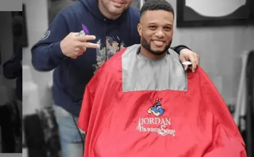 Jordan junto a Canó.