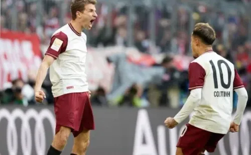 Müller festeja a todo pulmón con el brasileño Coutinho (Getty Images)