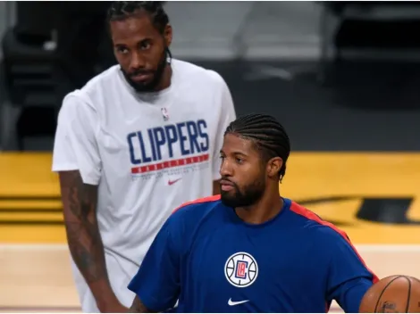 Kawhi Leonard and Paul George react after Clippers beat Lakers in season opener