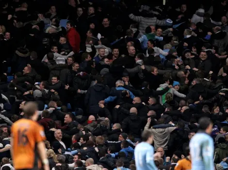 Why do Manchester City fans turn their backs when they celebrate goals?