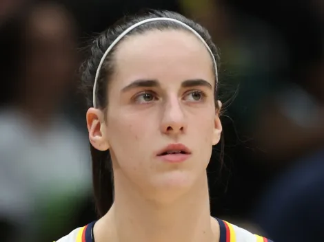 Why is Caitlin Clark not playing for the USA basketball women's team in the Paris 2024 Olympic Games?