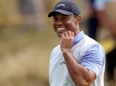 Why is Tiger Woods not playing at the Paris 2024 Olympic Games?