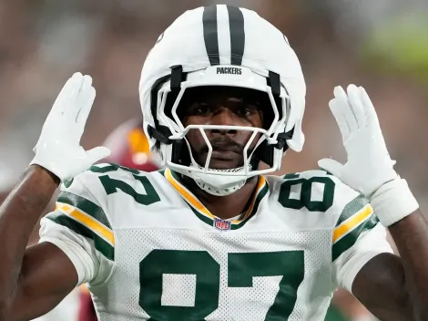 Why does Romeo Doubs wear a padded helmet?