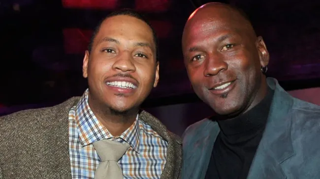 (L-R) Former NBA players Carmelo Anthony, and Michael Jordan attend the Exclusive FABULOUS 23 Dinner hosted by Jordan Brand during All-Star Weekend on February 12, 2010 in Dallas, Texas. (Photo by Charley Gallay/Getty Images for Jordan Brand)