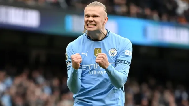 Erling Haaland of Manchester City celebrates after scoring his team’s first goal from the penalty spot during the Premier League match between Manchester City FC and Brighton &amp; Hove Albion FC in 2025. (Source: Gareth Copley/Getty Images)