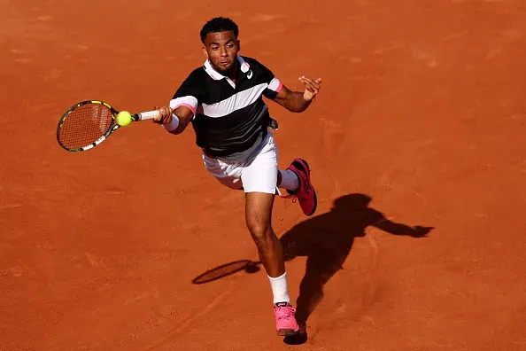 Fils não passou da estreia de Roland Garros. Créditos: Clive Brunskill/Getty Images