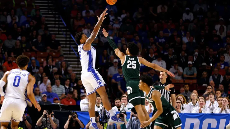 GREENVILLE, SC - MARCH 20: Paolo Banchero #5 of the Duke Blue Devils puts up a shot against Malik Hall #25 of the Michigan State Spartans during the first half in the second round game of the 2022 NCAA Men's Basketball Tournament at Bon Secours Wellness Arena on March 20, 2022 in Greenville, South Carolina. (Photo by Lance King/Getty Images)