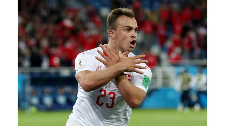 KALININGRAD, RUSSIA - JUNE 22:  Xherdan Shaqiri of Switzerland celebrates after scoring his team's second goal during the 2018 FIFA World Cup Russia group E match between Serbia and Switzerland at Kaliningrad Stadium on June 22, 2018 in Kaliningrad, Russia.  (Photo by Clive Rose/Getty Images)
