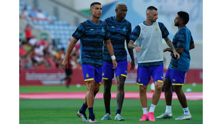 FARO, PORTUGAL - JULY 20: Cristiano Ronaldo of Al Nassr with teammates in action during the warm up before the start of the Pre-Season Friendly match between Al Nassr and SL Benfica at Estadio Algarve on July 20, 2023 in Faro, Portugal.  (Photo by Gualter Fatia/Getty Images)
