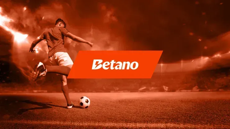 Imagem em tons de laranja, com jogador pronto a chutar bola do lado esquerdo do campo de futebol, e logo da Betano ao centro