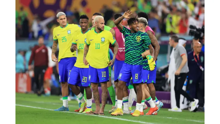 DOHA, QATAR - DECEMBER 05: Vinicius Junior, Neymar and Fred of Brazil acknowledge the fans after the team's victory during the FIFA World Cup Qatar 2022 Round of 16 match between Brazil and South Korea at Stadium 974 on December 05, 2022 in Doha, Qatar. (Photo by Buda Mendes/Getty Images)
