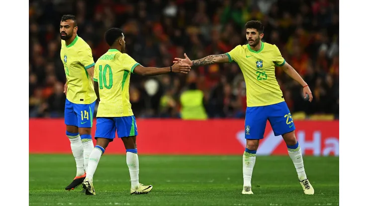 Jogadores do Brasil atuando. (Foto de Denis Doyle/Getty Images)
