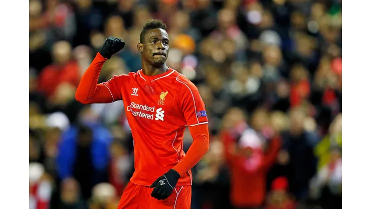 LIVERPOOL, ENGLAND - FEBRUARY 19:  Mario Balotelli of Liverpool celebrates after scoring the opening goal from the penalty spot during the UEFA Europa League Round of 32 match between Liverpool FC and Besiktas JK at Anfield on February 19, 2015 in Liverpool, United Kingdom.  (Photo by Julian Finney/Getty Images)
