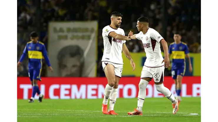 BUENOS AIRES, ARGENTINA - SEPTEMBER 23: Leandro Diaz celebrates with teammate Braian Aguirre after scoring the first goal of his team   during a match between Boca Juniors and Lanus as part of Group B of Copa de la Liga Profesional 2023 at Estadio Alberto J. Armando on September 23, 2023 in Buenos Aires, Argentina. (Photo by Daniel Jayo/Getty Images)
