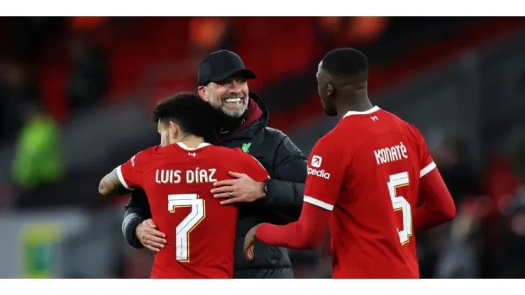 Juergen Klopp, Manager of Liverpool, Luis Diaz and Ibrahima Konate of Liverpool celebrate following the team's victory in the Carabao Cup Semi Final First Leg match between Liverpool and Fulham at Anfield on January 10, 2024 in Liverpool, England. (Photo by Clive Brunskill/Getty Images)
