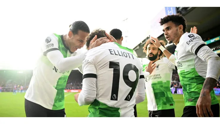 Harvey Elliott of Liverpool celebrates with Virgil van Dijk of Liverpool after scoring his team's second goal during the Premier League match between Crystal Palace and Liverpool FC at Selhurst Park on December 09, 2023 in London, England. (Photo by Justin Setterfield/Getty Images)
