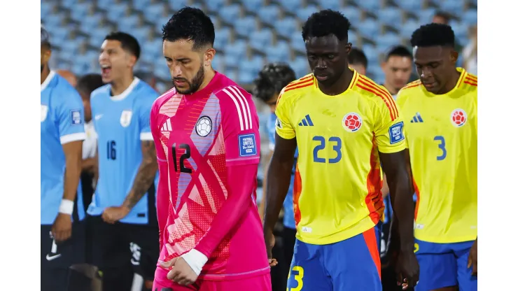 Camilo Vargas and Davinson Sanchez of Colombia enter the pitch prior to the South American Qualifier match between Uruguay and Colombia at Centenario Stadium on November 15, 2024 in Montevideo, Uruguay.  (Photo by Ernesto Ryan/Getty Images)
