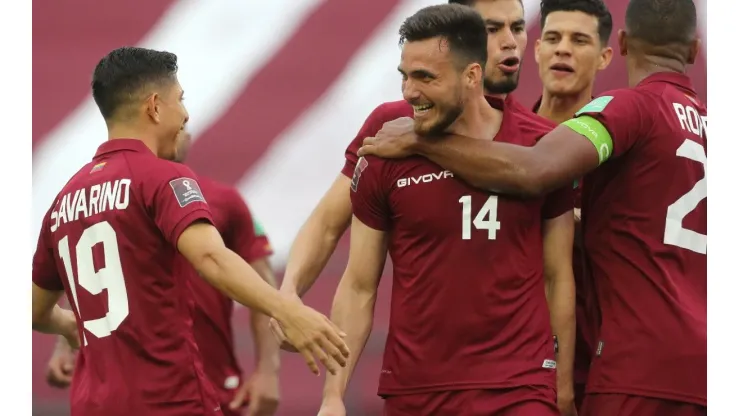 Luis Mago (center) celebrates after scoring Venezuela's first goal against Chile. (Getty)
