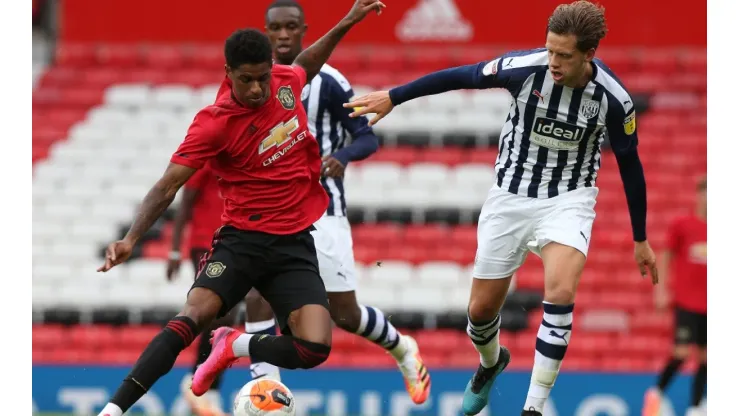 Marcus Rashford of Manchester United (left) in action during a practice match between Manchester United and West Bromwich. (Getty)
