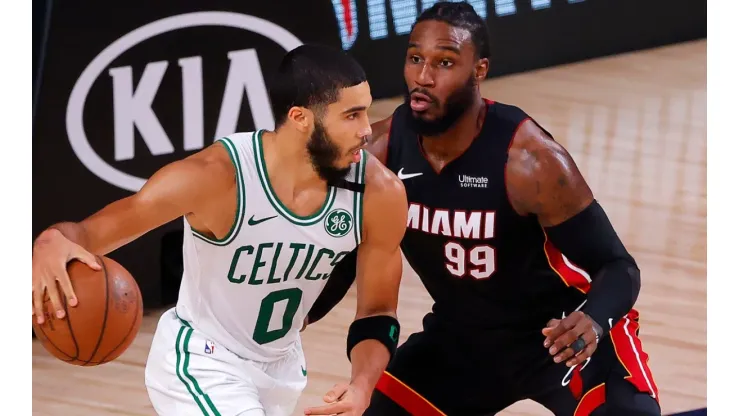 Jayson Tatum of the Boston Celtics (left) drives against Jae Crowder of the Miami Heat (right). (Getty)
