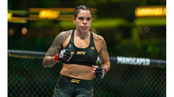 Amanda Nunes enters the octagon and does a lap before a fight.
