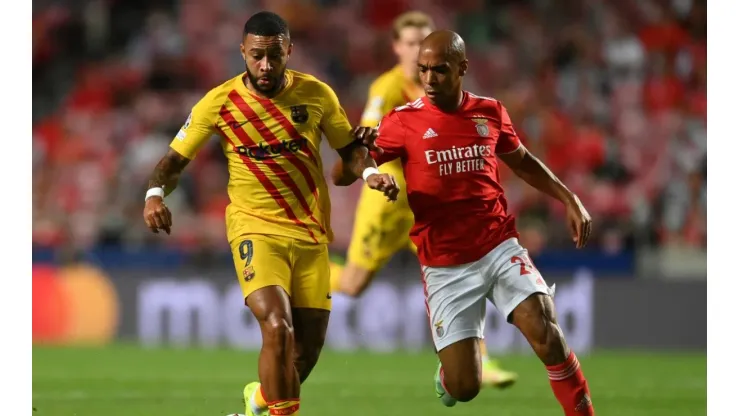 Memphis Depay of Barcelona against Joao Mario of Benfica.
