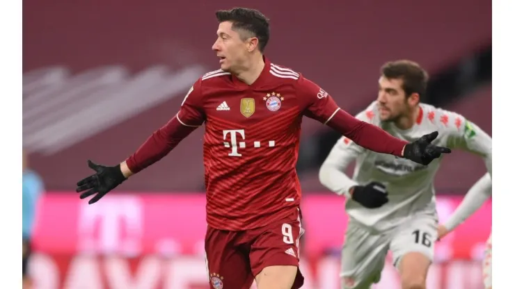 Robert Lewandowski gestures during a Bundesliga match
