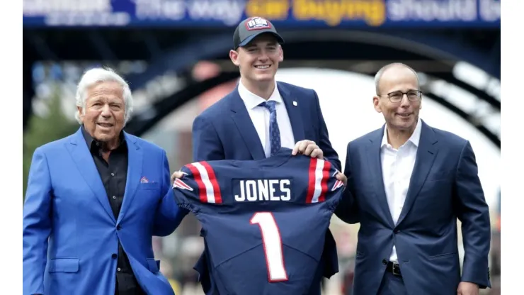 Mac Jones, Robert Kraft, and Jonathan Kraft
