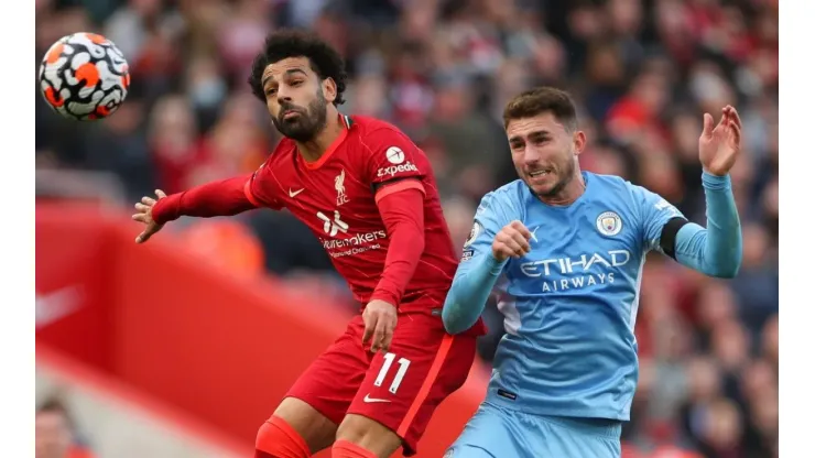 Mohamed Salah of Liverpool and Aymeric Laporte of Manchester City
