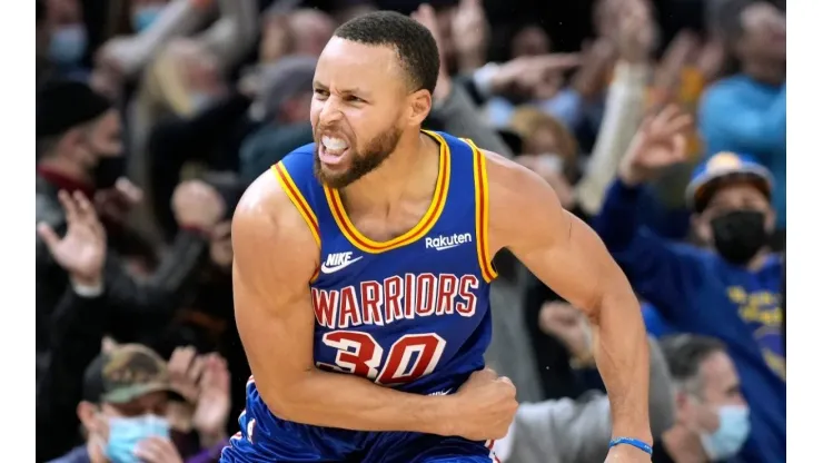 Stephen Curry of the Golden State Warriors reacts after making a three-point shot against the Memphis Grizzlies
