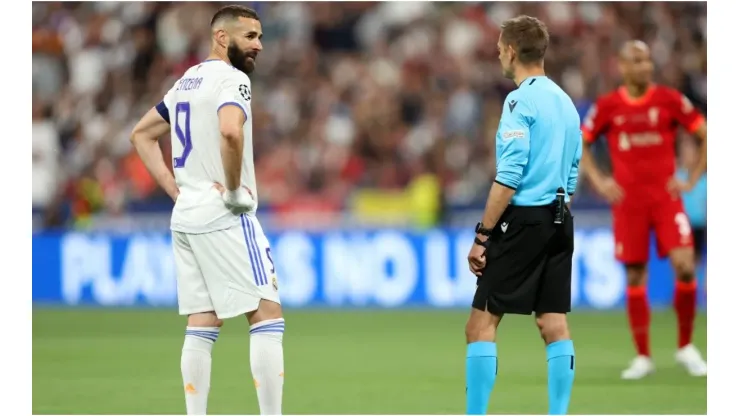 Benzema with referee
