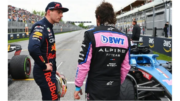 Pole position qualifier Max Verstappen of Red Bull Racing talks with Second placed qualifier Fernando Alonso of Alpine
