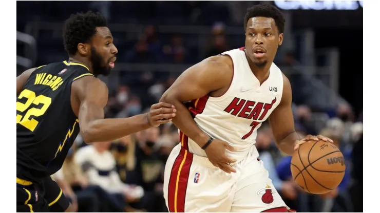 Kyle Lowry of the Miami Heat is guarded by Andrew Wiggins of the Golden State Warriors
