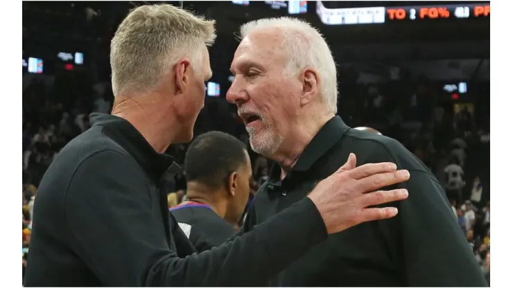 Head coach of the Golden State Warriors Steve Kerr greets San Antonio head coach Gregg Popvich
