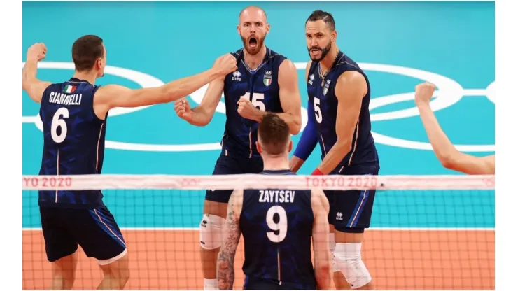 Riccardo Sbertoli of Team Italy reacts with team mates
