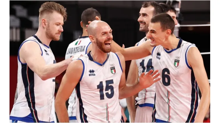 Riccardo Sbertoli of Team Italy reacts with team mates
