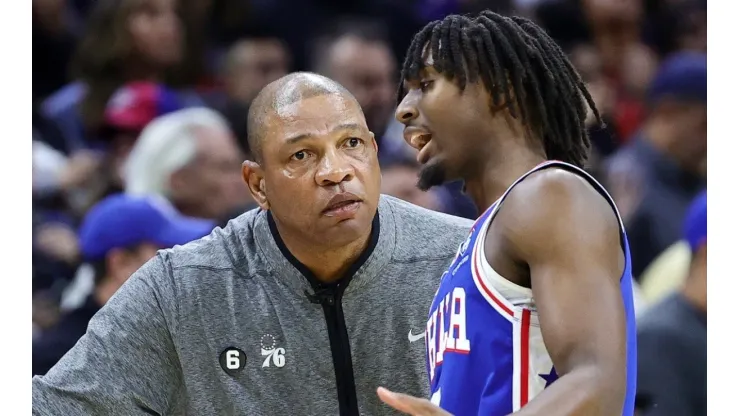 Head coach Doc Rivers speaks with Tyrese Maxey of the Philadelphia 76ers
