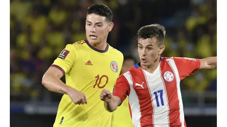 Andres Cubas of Paraguay and James Rodriguez of Colombia
