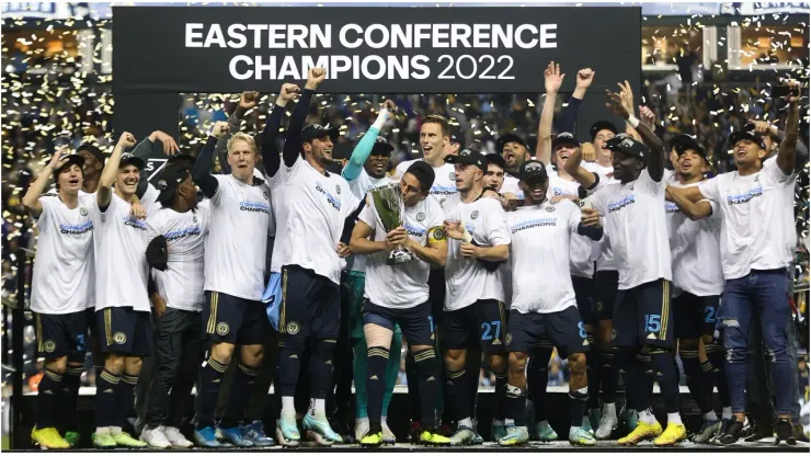 Alejandro Bedoya of Philadelphia Union hoists the trophy after the Union defeated New York City
