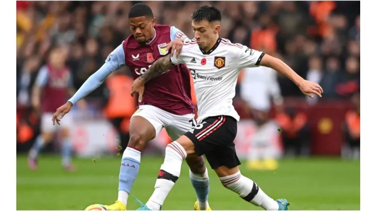 Lisandro Martinez of Manchester United challenges Leon Bailey of Aston Villa
