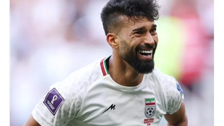 Ramin Rezaeian of IR Iran celebrates after scoring their team's second goal during the FIFA World Cup Qatar 2022 Group B match.
