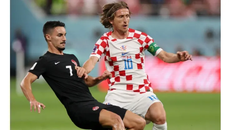 Luka Modric of Croatia and Stephen Eustaquio of Canada
