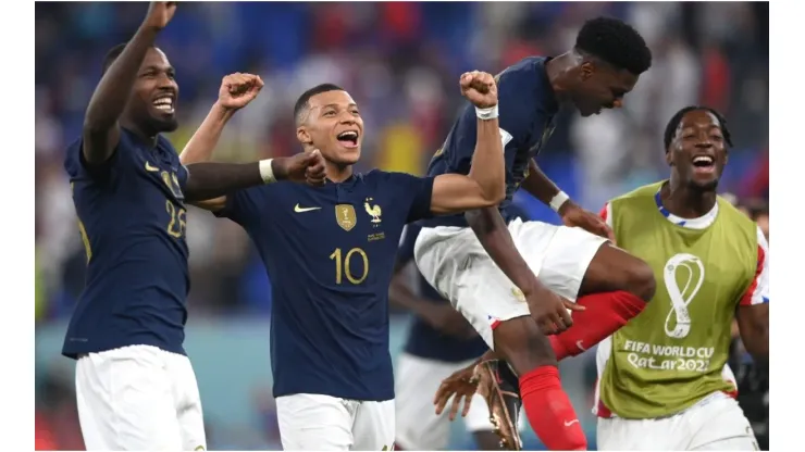 France striker Kylian Mbappe (10) celebrates with team mates
