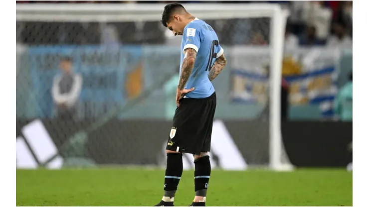 Mathias Olivera of Uruguay shows dejection after the team fails to qualify for the knockout stage
