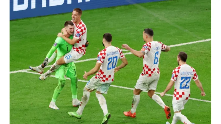 Domink Livakovic celebrates with his teammates
