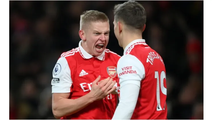 Oleksandr Zinchenko celebrates with Leandro Trossard of Arsenal
