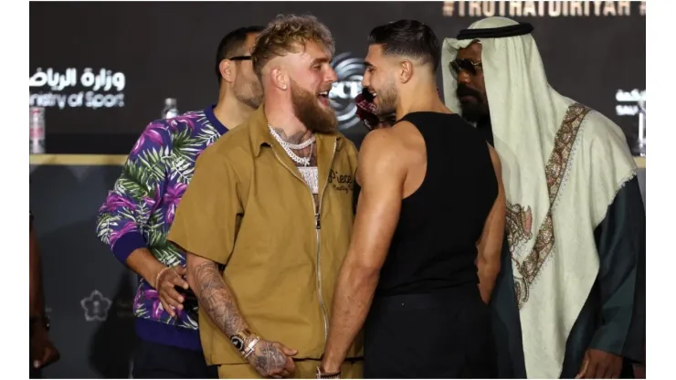 Jake Paul and Tommy Fury (R) clash during the Press Conference
