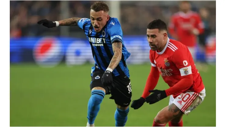 Noa Lang of Club Brugge is tackled by Nicolas Otamendi of Benfica
